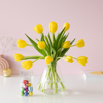 Yellow tulips with Easter eggs